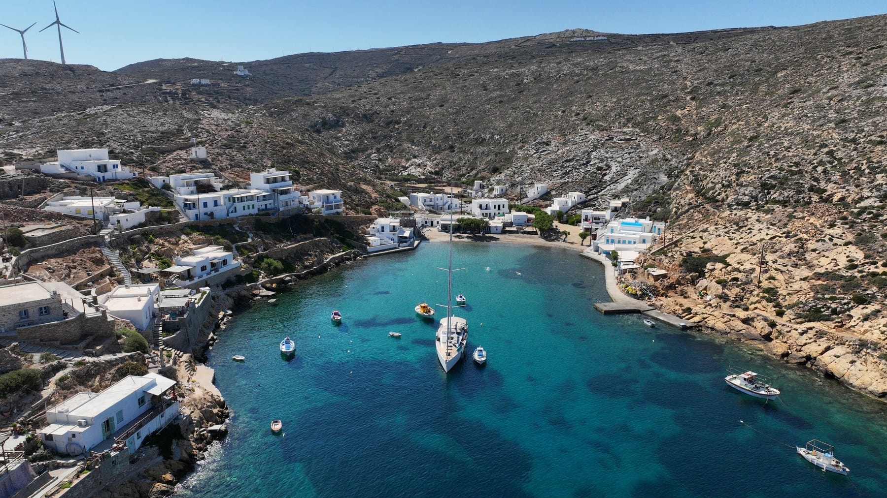 Heronissos fishing cove and sandy beach at the northern tip of Sifnos